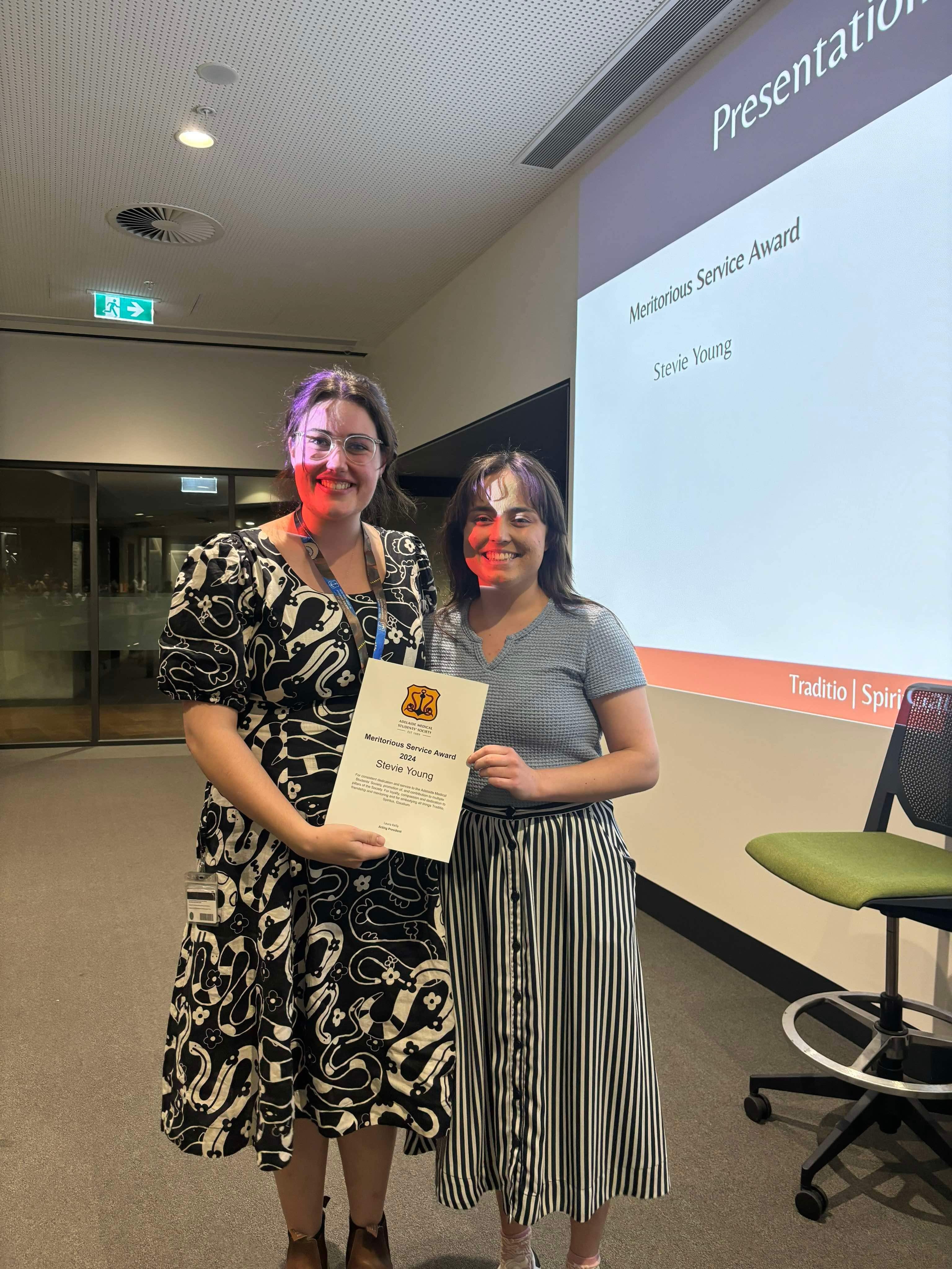 Stevie receiving her award at the AGM