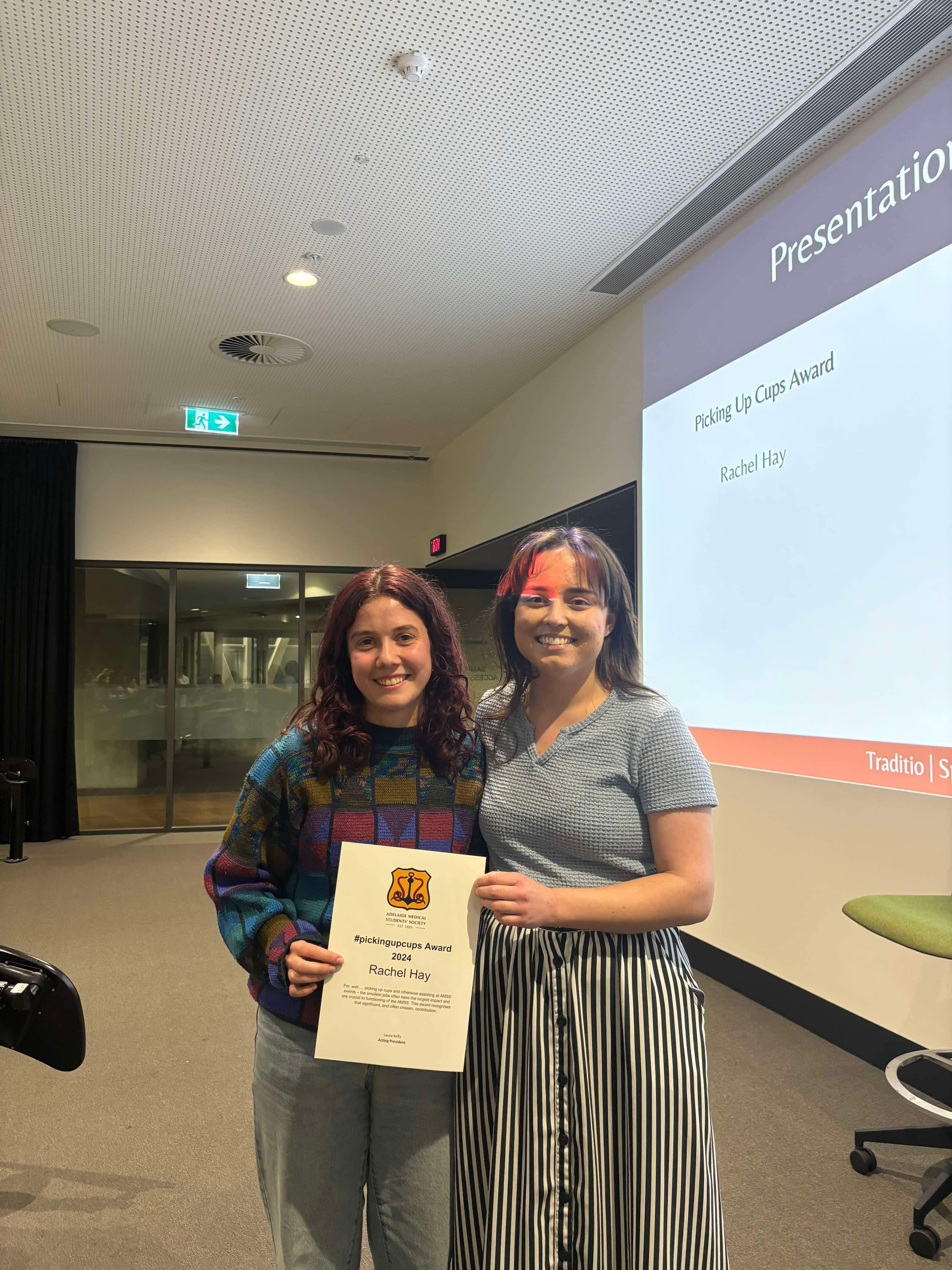 Rachel receiving her award at the AGM